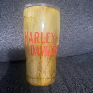 This was made with alcohol, ink resin, and vinyl comes w 16 oz Tumblr a$ cover.